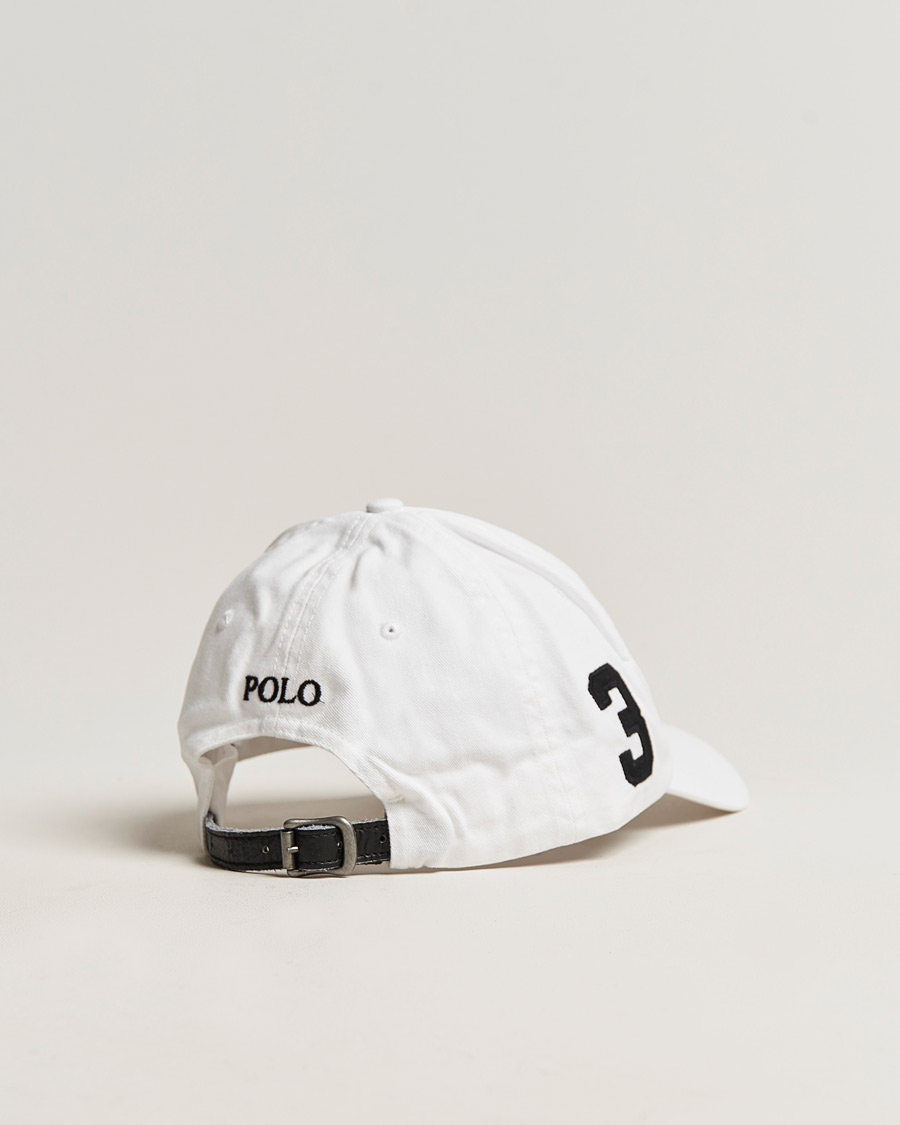 Black polo hat with white pony online