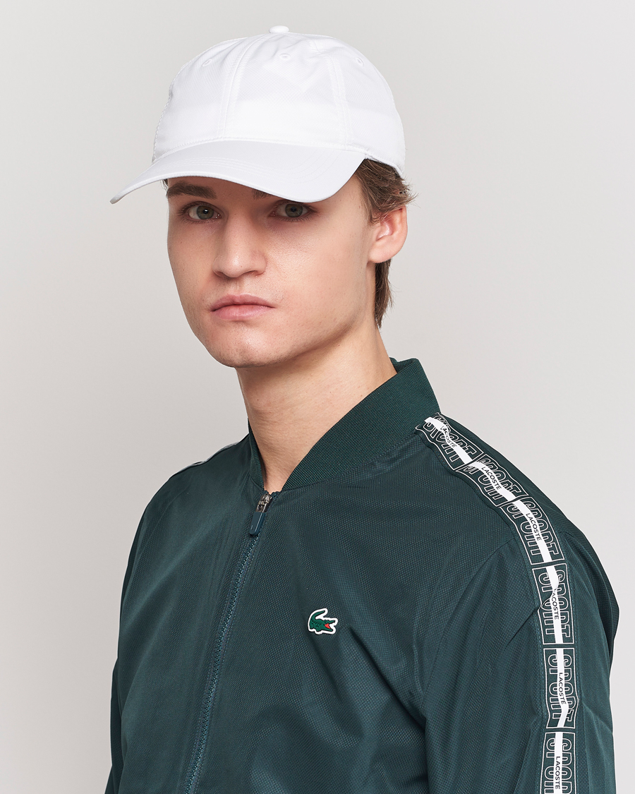 White Sport Cap Care Lacoste of Sports bei Carl