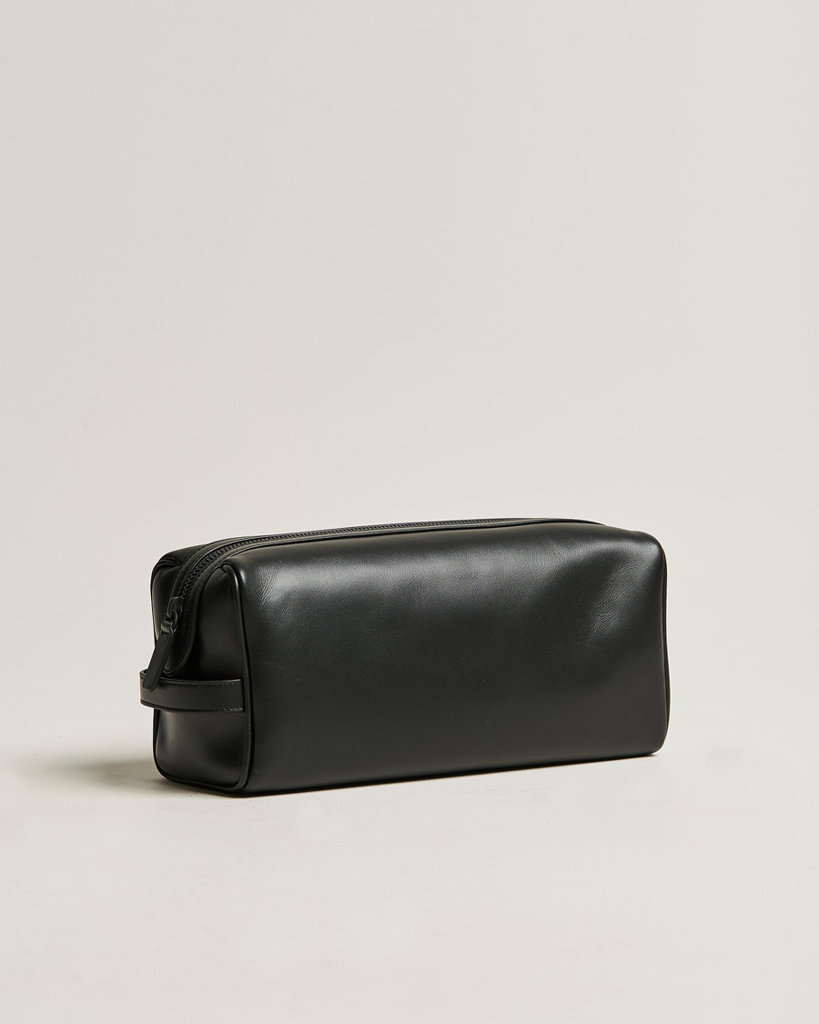 Black leather toiletry bag on sale