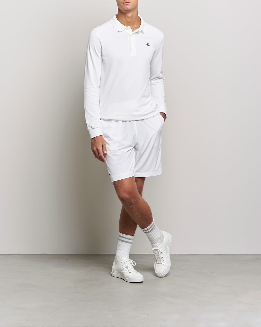 Lacoste deals all white