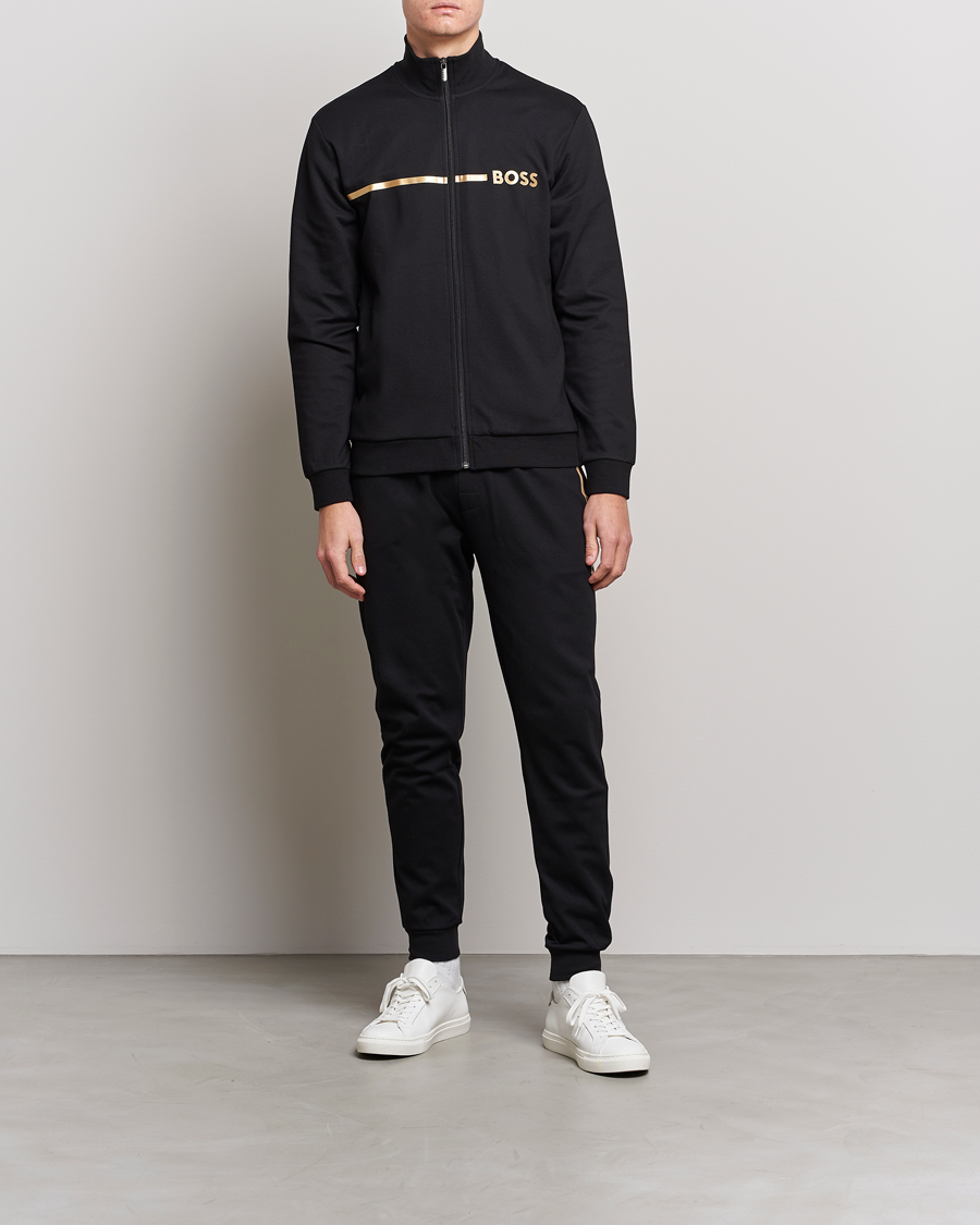 Black and gold tracksuit online