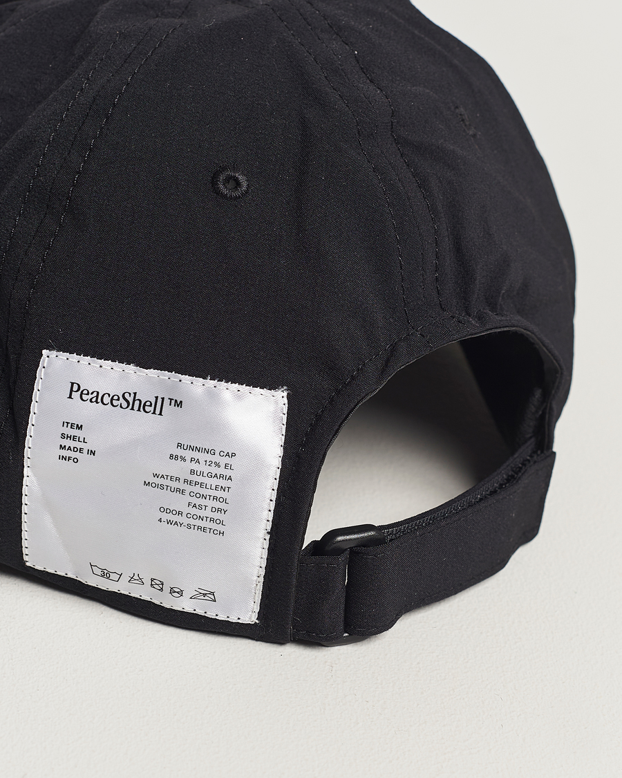 Satisfy PeaceShell Running Cap Black bei CareOfCarl.de