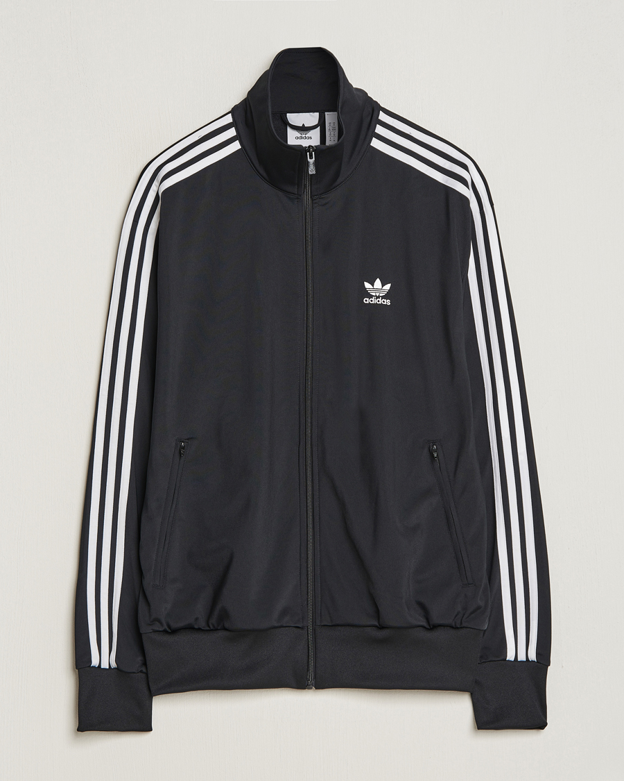 Weiße adidas jacke mit goldenen sales streifen