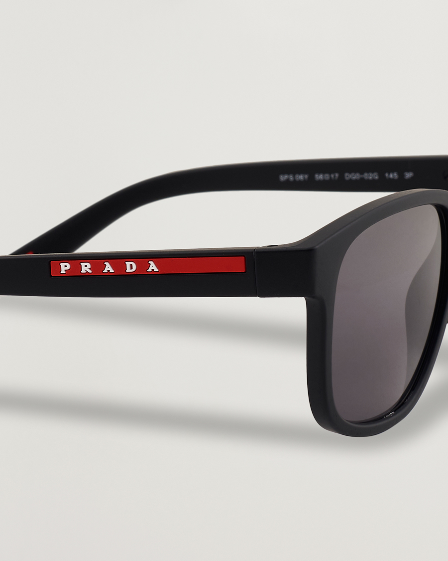 Prada Linea Rossa 0PS 06YS Polarized Sunglasses Black bei Care of Carl