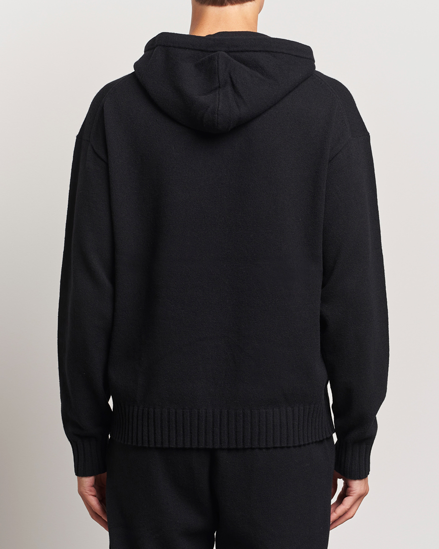 Black knitted hoodie on sale