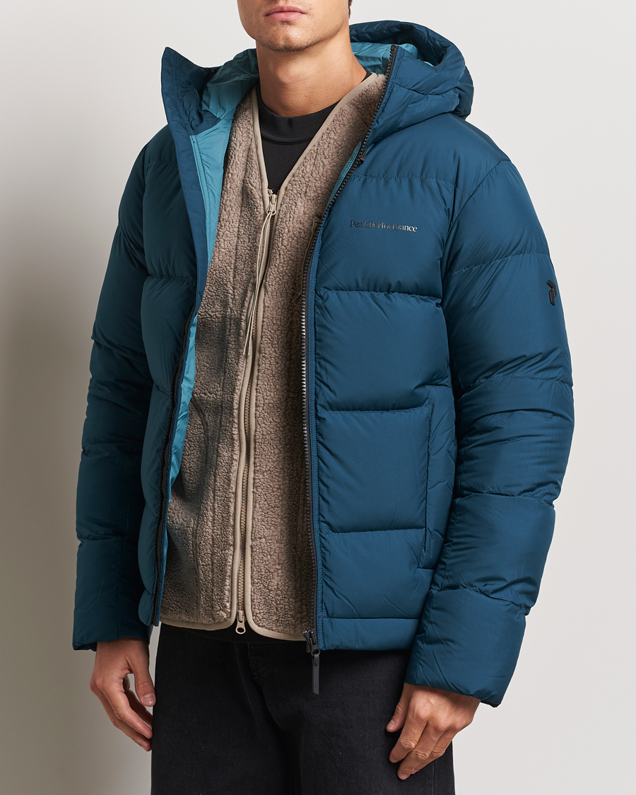 Herren |  | Peak Performance | Rivel Down Hooded Jacket Ininity Teel